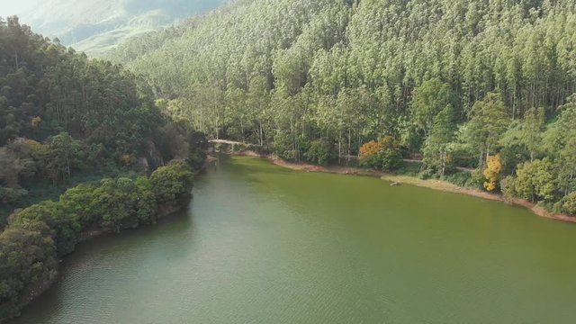 Aerial view beautiful nature with mountains and hills by Lake Mattupetty. Kerala State. Near the city of Munar.