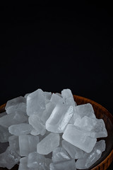 Single crystal rock sugar on black background