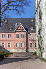 Fototapeta na wymiar Pink building in the historic center of Lippstadt, Germany