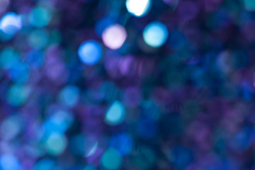 abstract blue colored background with blurred highlights and beautiful bokeh