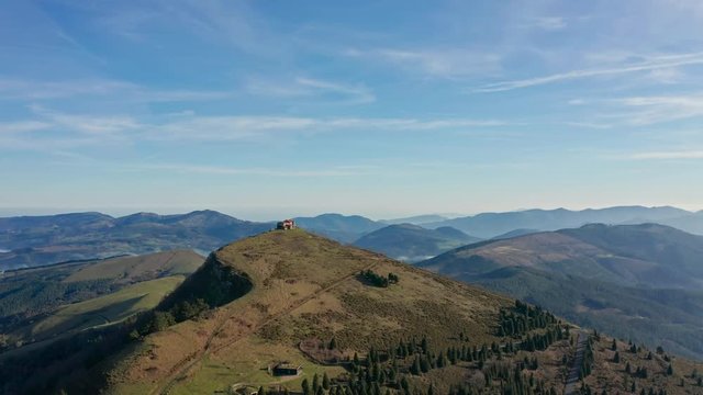 Hermitage in Kolitza peak in Balmaseda 4, Basque Country, Spain drone aerial footage - graded (ungraded version available)