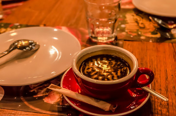 Hot chocolate in cup at dinner time