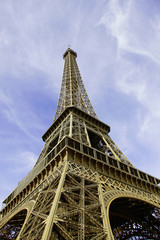 Eiffel Tower in Paris Against Nice Blue Cloudy Sky