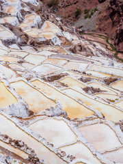 Detail of the salt terraces in the salt pans of Maras, salineras de Maras near Cusco in Peru, salt mines made by man
