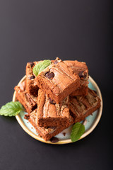 Healthy food concept Homemade organic fudge sunflower seeds butter brownies on black background