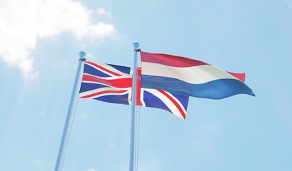 UK and Netherlands, two flags waving against blue sky. 3d image
