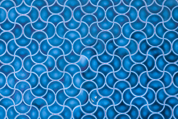 blue mosaic tile with arabic pattern