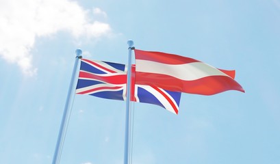 UK and Austria, two flags waving against blue sky. 3d image