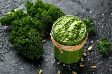 Poster Vegan kale pesto with roasted pine nuts and sea salt flakes © grinchh