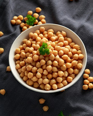 Fresh raw chickpeas in white bowl. Healthy food