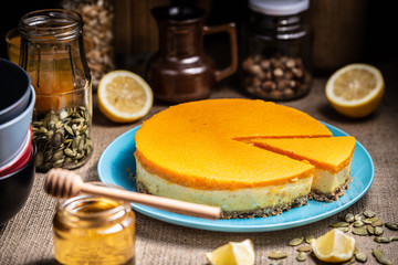 Cheesecake slice on a blue plate