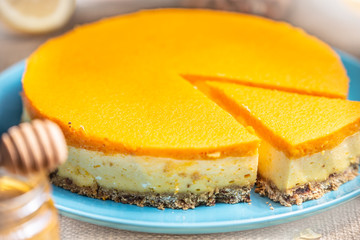 Cheesecake slice on a blue plate