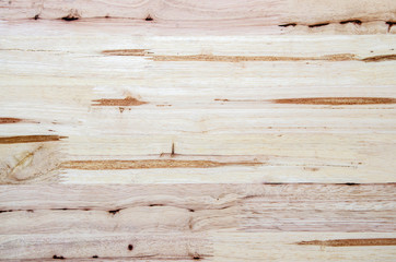 Light brown natural wooden background. Closeup grunge wooden table texture