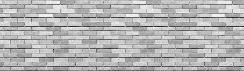 Papier Peint photo autocollant Mur de briques Abstract gray brick wall texture background. Horizontal panoramic view of masonry brick wall.