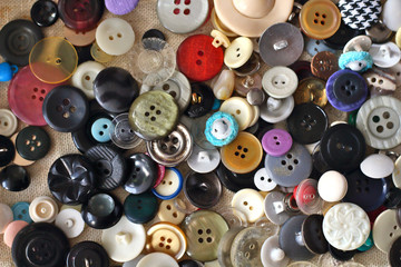 Many different bright vintage and new multicolored sewing buttons background