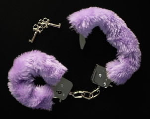 Purple handcuff with key