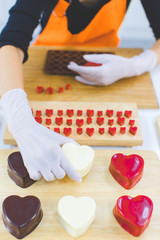 Woman making chocolate