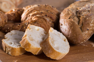 slices of wheaten bread on wooden surface