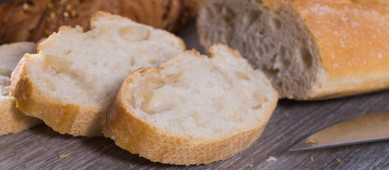 slices of wheaten bread on wooden surface