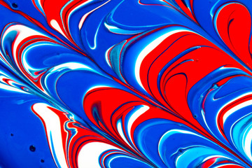 Fototapeta na wymiar Abstract seamless background of red, white and blue liquid paint swirls
