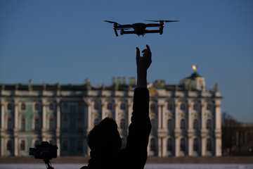 Fototapeta premium Drone flies over the city center on the background of the sights of St. Petersburg. Photographs and videotaping.