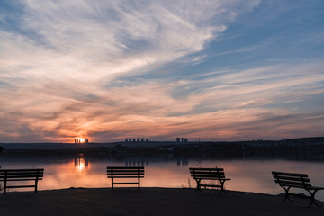Fototapeta na wymiar Sunset at the lake landscape. lovely sky 