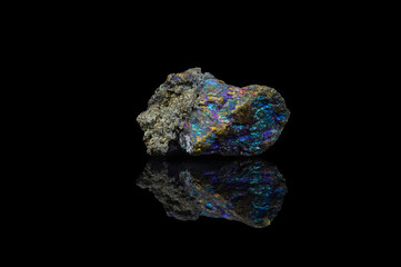Chalcopyrite isolated black background with mirror reflection