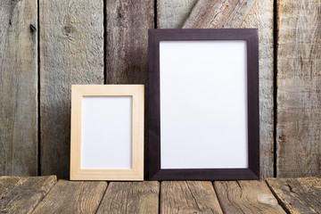 picture frame blank paper at rustic wooden interior