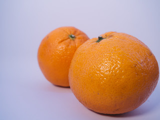 Ripe oranges isolated in a white background.