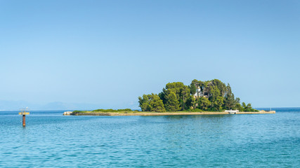 Corfu, Kerkyra view from the coast at the Pantokrator church on the island of Pontikonisi.