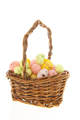 Wicker basket with easter eggs