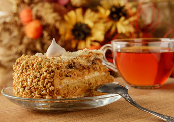 A piece of cake for morning tea on the table. close-up