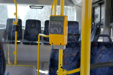 Ticket validator, card reader in public bus. Device for reading and scanning of public transport cards  to pay for riding in public transport. 