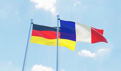 France and Germany, two flags waving against blue sky. 3d image