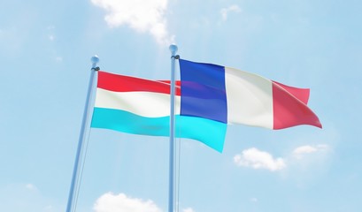 France and Luxembourg, two flags waving against blue sky. 3d image