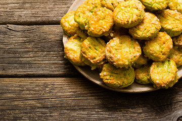 homemade baked scone cakes from fresh ramson leaves and cheese, old wooden texture