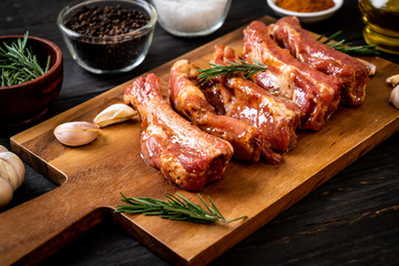 Fresh raw pork ribs ready for roasting with ingredients