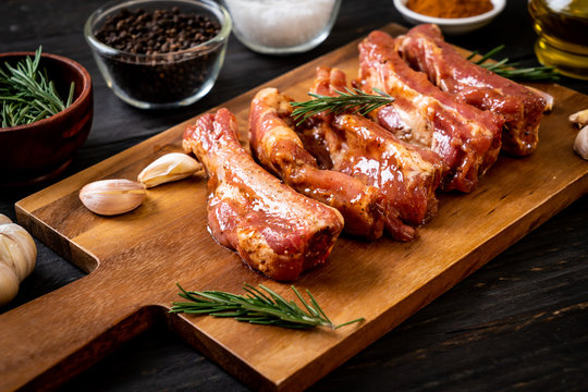 Fresh raw pork ribs ready for roasting with ingredients