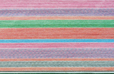 colorful background with soft faded rainbow-colored horizontal stripes