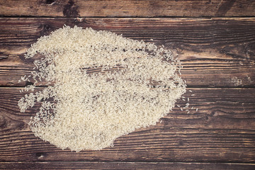 White rice on wooden table