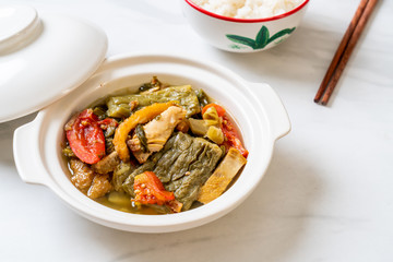 Bitter gourd and preserved mustard green soup with pork