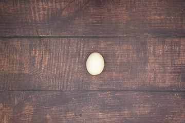 Boiled egg on wooden table
