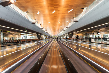 Moving walkways travolator in new Hamad International Airport territory in Doha, Qatar