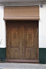 Naklejka na ściany i meble Closeup of a typical old town gate