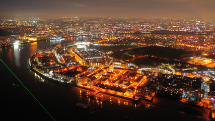 Fototapeta na wymiar Aerial drone night shot from iconic Greenwich Peninsula in the heart of London, United Kingdom