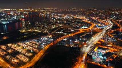Fototapeta premium Aerial drone night shot from iconic Greenwich Peninsula in the heart of London, United Kingdom