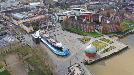 Aerial drone photo of famous Cutty Sark the only tea clipper survived and used as a museum next to...