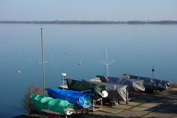 Ships on the shore of a shipyard near the lake