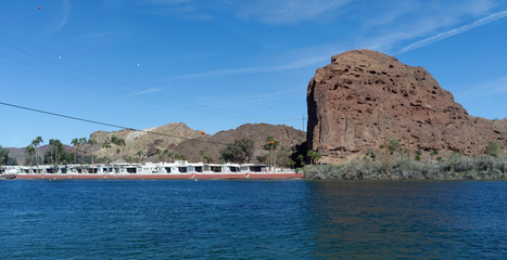 Boating on the Colorado River with view of vacation retirement homes on the California side.