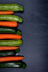 Fresh organic wet carrots and zucchini.